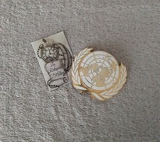 Insigne béret onu - de,