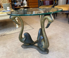 TABLE BASSE WILLY DARO DECOR FLAMANDS EN BRONZE ET PLATEAU ROND EN VERRE