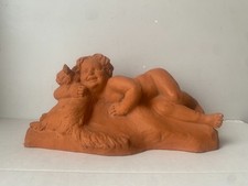Ancienne sculpture terre - en,