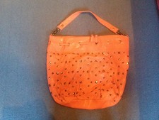 Sac clouté orange corail