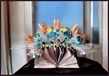 Centre de table - art floral - dans livre ouvert