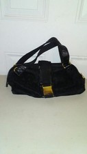 black and gold purse