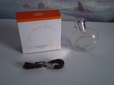MINIATURE DE PARFUM"EAU DES MERVEILLES"D'HERMES-7,5ML