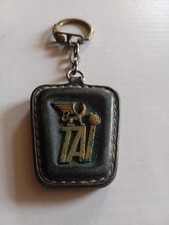 ancien porte clé TAI compagnie aerienne , cuir surpiqué