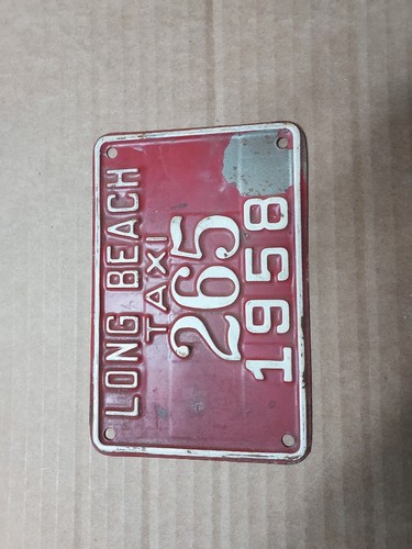 Taxi license plate - plate., beach