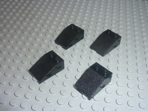 Lego black slope brick - x,