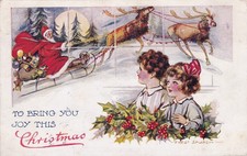 CPA FANTAISIE :  FRED SPURGIN PERE NOEL SUR SON TRAINEAU