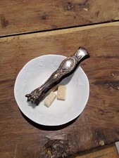 Pince à sucre en métal argenté style Louis XV pattes de Lion