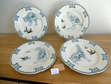 QUATRE ASSIETTES PLATES