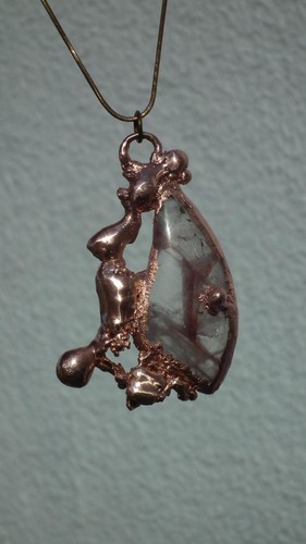 Pendentif rouge guérisseur