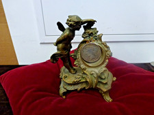 porte montre/médaille au cupidon,soclé,régule,H 16cm,XIXème