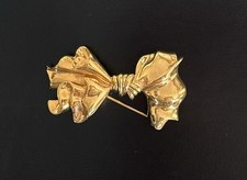 Broche design nœud NINA RICCI vintage 1980s