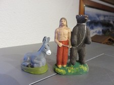 Âne, ours avec dresseur