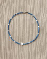 Blue Bracelette in wool with a