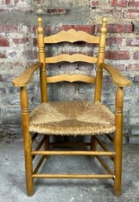 Fauteuil paillé en bois