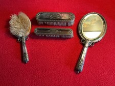 Ancien nécessaire de toilette 4 pièces aspect métal argenté marque Alpacca