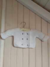 Paletot bébé tricoté mains 