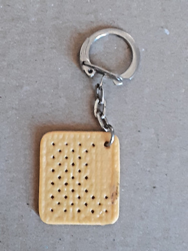 Ancien porte clé publicitaire