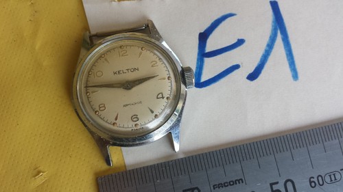 Ancienne montre mécanique - e1/,