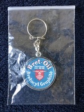 Ancien porte-clés publicitaire. Bret-Oil Bretocyl Graphité. Peugeot 1896.