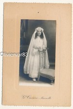 Vintage studio photo - thoughtful young girl in Catholic communion dress