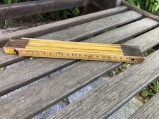 ancien double metre en bois