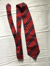 Cravate 100 % soie PIERRE BALMAIN marine rouge en parfait état.