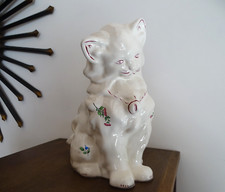 Chat assis faience KG