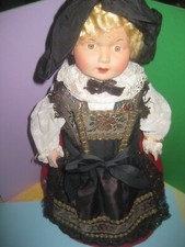 PETITCOLLIN Poupée 40cm tête celluloïd habillée en alsacienne corps bouteille