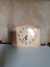  Pendule en tôle émaillée