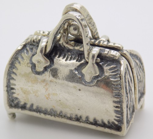 Figurine sac main - figurine, À