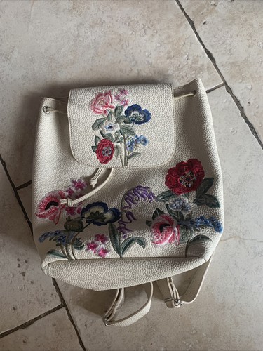 Sac dos crème - à,
