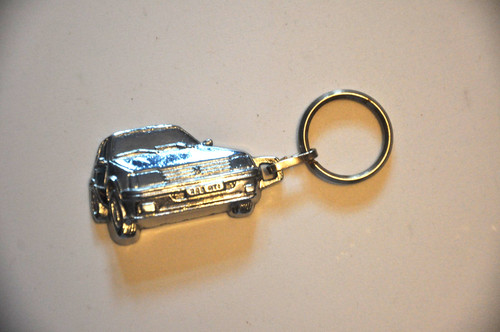 Ancien porte clé publicitaire