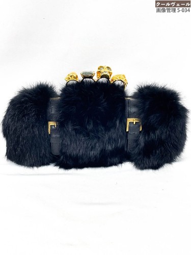 Sac pochette articulé crâne