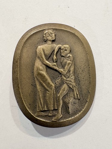 Ancien badge médaille