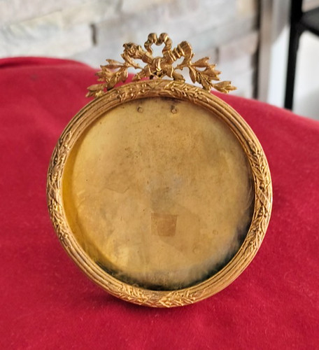 Cadre rond ornements bronze - en,