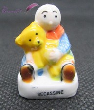 Fève Série Bécassine avec un ourson jaune 1994 Hachette #G13