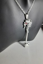 pendentif clef hippocampe double face avec strass et chaîne