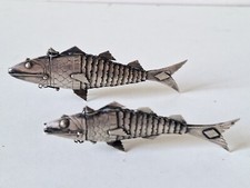 2 poissons articulés en