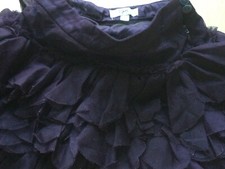 Belle jupe courte mauve pour fille de la marque Repetto, taille 4 ans /102 cm,