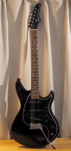 Rare guitare électrique - , noire