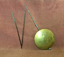 Ancien balancier d'horloge