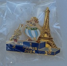 pin's bd astérix,obélix,idéfix aux jo/paris tour eiffel