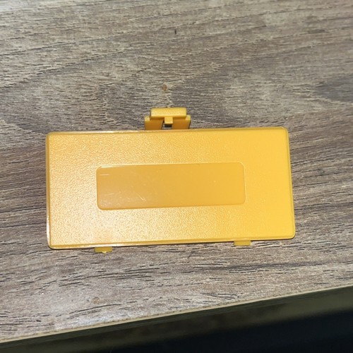 Cache pile jaune gameboy - pile,