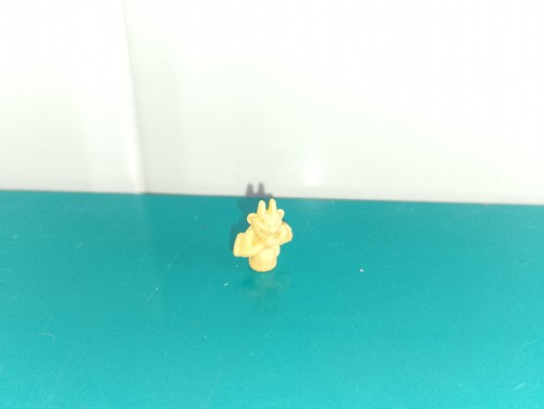 Polly pocket figurine doll