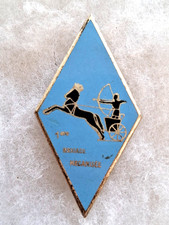 Un insigne militaire " 1°