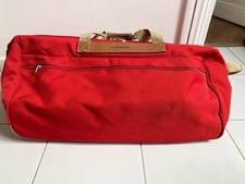 sac de voyage Lancel rouge à