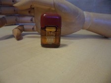 Miniature Parfum  Ted Lapidus " TL"  Entamé  sans  boite