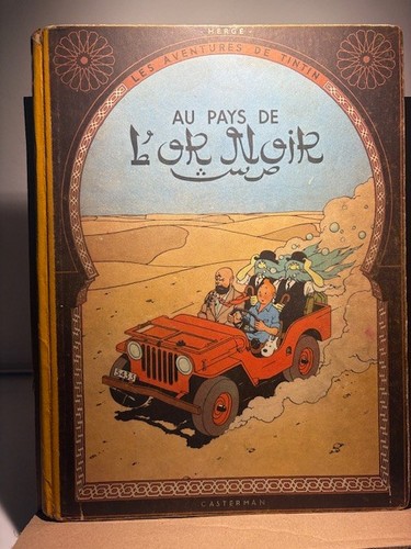 Tintin pays l - , "au