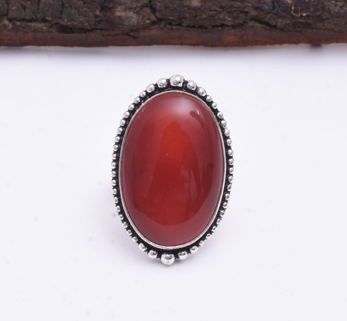 Bague fait main - main, en